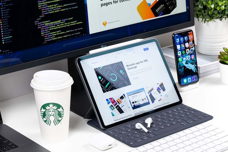 A person holding a credit card while shopping on a laptop at home