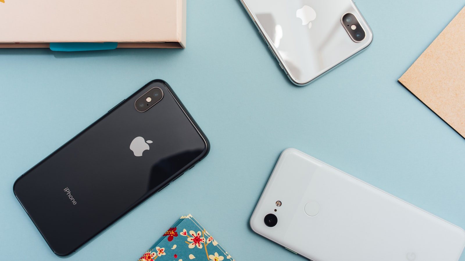 Two smartphones placed side by side during a data transfer setup